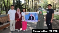 Protesters with relatives believed to be imprisoned in Beijing’s camp system in Xinjiang hold a small gathering in Almaty on September 5.