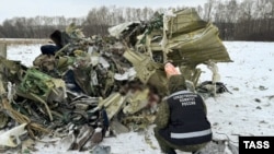 Debris at the crash site of an Ilyushin Il-76 on January 24 