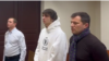 Vacio (center) appears in court in Moscow on December 22.