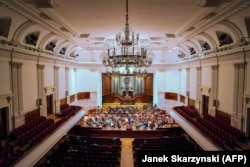 Members of the Kyiv Symphony Orchestra during a rehearsal in the Warsaw Philharmonic Concert Hall on April 19.