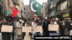 Shi'ite Muslims protest in Peshawar on March 6 after a suicide bomber killed 64 people at a mosque two days earlier. 