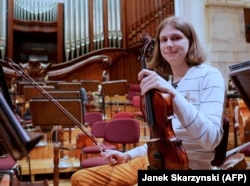 Oleksiy Pshenychnikov, who plays second violin in the orchestra, during a rehearsal in Warsaw.