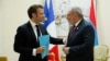 Armenian Prime Minister Nikol Pashinian (right) meets with French President Emmanuel Macron in Djerba, Tunisia, on November 19.