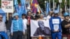 Demonstrators march on May 13 in Geneva outside UN headquarters over what they say is a lack of attention to the persecution of Uyghurs and other groups in China by UN High Commissioner for Human Rights Michelle Bachelet. 