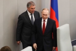 Russian State Duma Speaker Vyacheslav Volodin (left) and Russian President Vladimir Putin