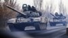 A column of tanks is photographed driving in rebel-held territory near Donetsk in eastern Ukraine. 