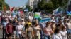 People take part in an anti-Kremlin rally in support of former regional governor Sergei Furga in the far eastern city of Khabarovsk on September 5.