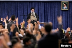 Iran's Supreme Leader Ayatollah Ali Khamenei looks on during a meeting with Iranian students in Tehran on March 12