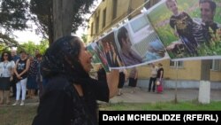 Mourners attend the Smiths' funeral in Marneuli in July 2018.