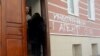 The offices of Russia's Memorial rights group in Moscow was vandalized with graffiti reading "foreign agent [heart] USA" in March 2013.