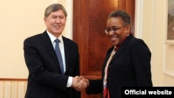 Kyrgyz President Almazbek Atambaev with U.S. Ambassador Pamela Spratlen at a February 2012 meeting