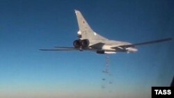 A Russian Tupolev Tu-22M3 long-range bomber drops bombs over Syria in January.