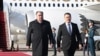 Tajik President Emomali Rahmon (left) is welcomed by Kyrgyz President Sadyr Japarov upon his arrival in Bishkek on March 12. 