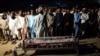 Locals from Gwadar attend the funeral for a victim of the August 20 attack claimed by the Balochistan Liberation Army (BLA).