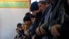 Crimean Tatars pray in the Khan Chair mosque in Bakhchisaray, near Simferopol.