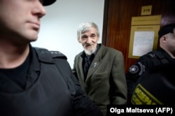 Historian Yury Dmitriyev was sentenced to 13 years on child sexual-abuse charges that he denies and that supporters contend have been fabricated to punish him for his work.