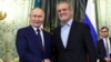 Russian President Vladimir Putin and Iranian President Masud Pezeshkian pose for a photo prior to talks at the Kremlin in Moscow on January 17.