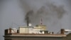 Black smoke billows from a chimney on top of the Russian Consulate in San Francsico on September 1. A fire department spokeswoman later told the Associated Press that the consulate had a fire going in the fireplace and that unidentified items were being burned.