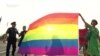 WATCH: LGBT activists staged Georgia's first pride parade amid heavy security in the capital, Tbilisi on July 8, after the event was halted earlier in the day due to security concerns. 