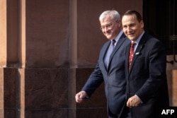 Ukrainian Foreign Minister Andriy Sybiha and Polish Foreign Minister Radoslaw Sikorski meet in Warsaw on March 12.