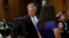 Jon Huntsman departs following a Senate Foreign Relations Committee hearing on his nomination to be ambassador to Russia on Capitol Hill in Washington, D.C., on September 19.