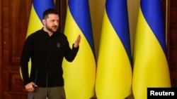 Ukrainian President Zelenskyy gives a press conference in Kyiv the day after Ukraine agreed to a US-brokered cease-fire proposal. 