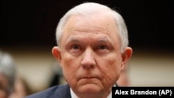 Attorney General Jeff Sessions listens at the beginning of a House Judiciary Committee hearing on Capitol Hill in Washington on November 14.