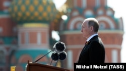 Russian President Vladimir Putin delivers a speech during a Victory Day parade in Moscow. This year, he has had to postpone the annual gala event due to the COVID-19 pandemic. (file photo)