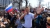 Aleksei Navalny addresses supporters during an unauthorized anti-Putin rally on May 5, 2018, in Moscow, two days ahead of Vladimir Putin's inauguration for a fourth Kremlin term.