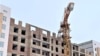 Kazakhstan – A tower crane on a construction site. Nur-Sultan, 10 March 2021