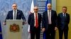 Georgian Prime Minister Mamuka Bakhtadze speaks to reporters on July 12 as he introduces new cabinet members in Tbilisi, including Education Minister Mikheil Batiashvili (right), Economy Minister Giorgi Kobulia (second right) and Finance Minister Vano Machavariani (third right). 